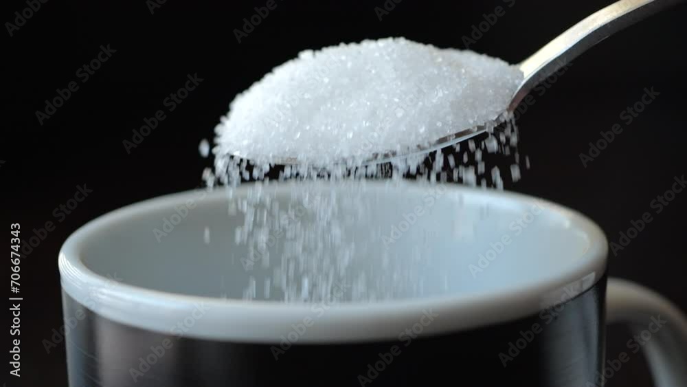 Slow Motion Putting Sugar in to Black Coffee. Sugar Falling Down Into Coffee Cup. Coffee Caffeine Addiction Junk Food. Concept of Unhealthy Eating, Diabetes, Obesity, Heart Disease. Slow Motion Putting Sugar in to Black Coffee. Sugar Falling Down Into Coffee Cup. Coffee Caffeine Addiction Junk Food. Concept of Unhealthy Eating, Diabetes, Obesity, Heart Disease.