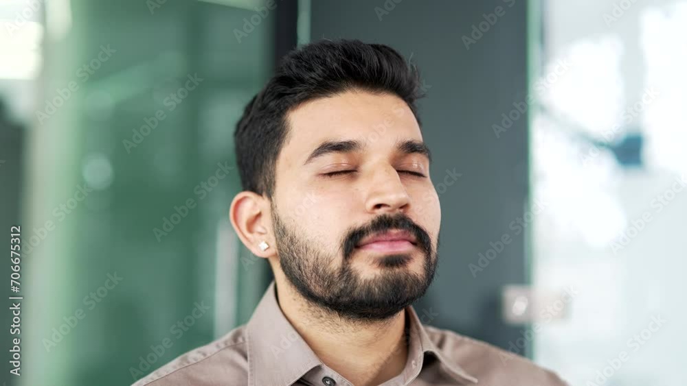 Close up. Handsome businessman relaxing with his eyes closed in a business office. Calm happy male resting, breathing deeply. Positive bearded employee enjoying the cool fresh air from air conditioner Close up. Handsome businessman relaxing with his eyes closed in a business office. Calm happy male resting, breathing deeply. Positive bearded employee enjoying the cool fresh air from air conditioner