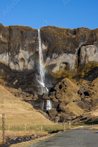 Waterfall with a rainbow Foss a Sidu, south Iceland photo
