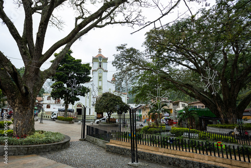 Salgar, Antioquia - Colombia. December 26, 2023. The Church of San Juan Evangelist, is a Colombian Catholic church, located in the main park. photo