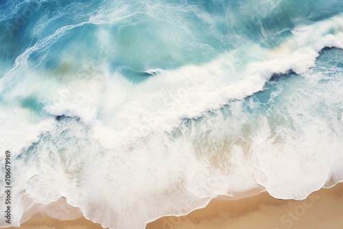 Sea waves on beach sand. Top view