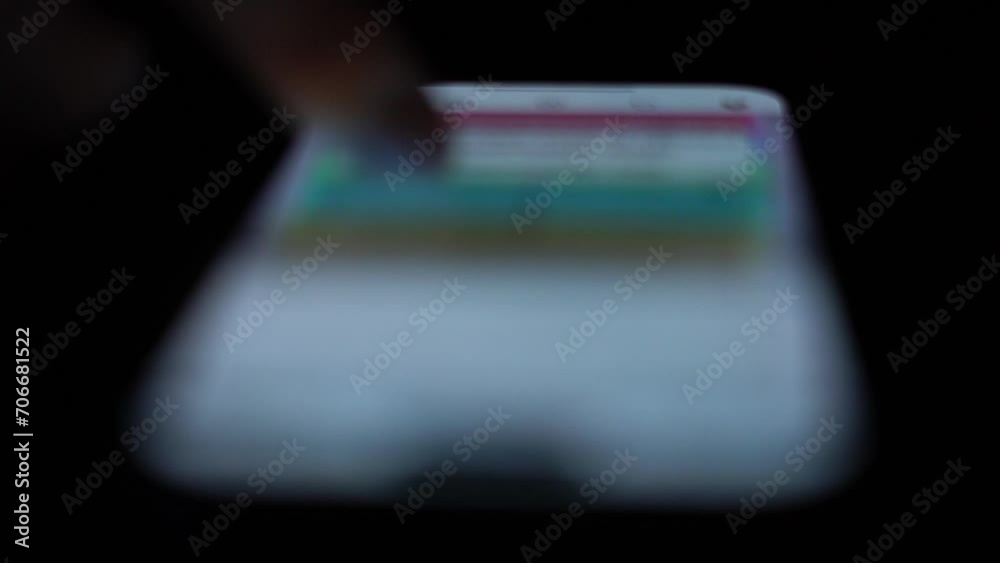 Man searching social networks using smartphone Man searching social networks using smartphone