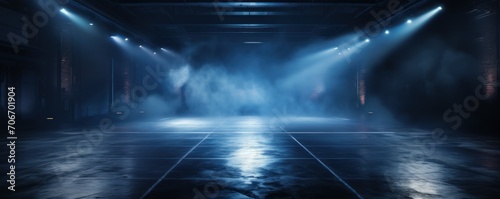 The dark stage shows, empty indigo, navy, midnight blue background, neon light, spotlights, The asphalt floor and studio room with smoke  © Lenhard
