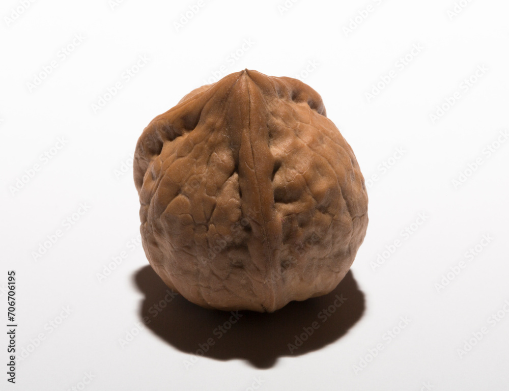 Walnuts are rounded, single-seeded stone fruits of the walnut tree. Tricuspid walnut. Walnuts are rounded, single-seeded stone fruits of the walnut tree. Tricuspid walnut.