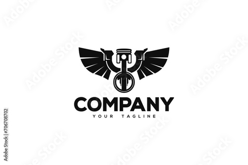 Creative logo design depicting an engine piston with wide and black wings on each side and a wrench. 