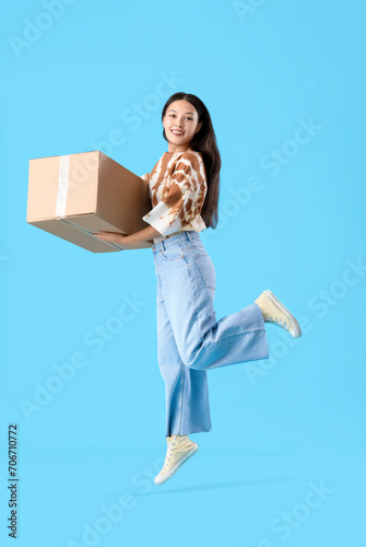 Young Asian woman with parc...