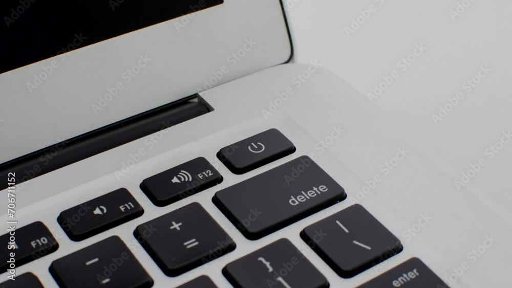 Close-up of laptop keys, symbolizing productivity and technology in contemporary work environments. Close-up of laptop keys, symbolizing productivity and technology in contemporary work environments.