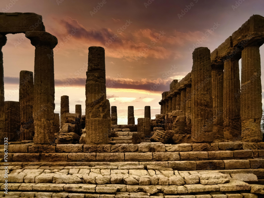 Agrigento (Italy, Sicily) the Valley of the Temples, a suggestive dawn illuminates the ruins of the Temple of Hera Lacinia (Juno)
