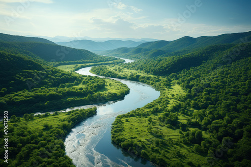 A meandering river cutting through lush green valleys, portraying the life-giving flow of freshwater ecosystems. Concept of river vitality. Generative Ai. © Sebastian