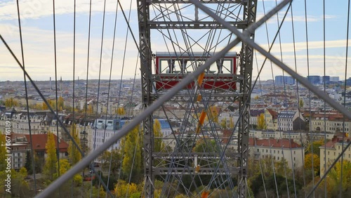 Wallpaper Mural Famous Viennese Giant Ferris Wheel inside cables, cabin, and cityscape view of downtown Vienna, Austria Torontodigital.ca