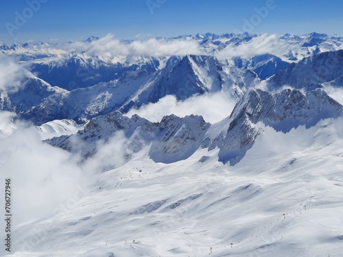 Snow covered mountain top in Austria. View of the Alps from the Zugspitze, the highest mountain in Germany