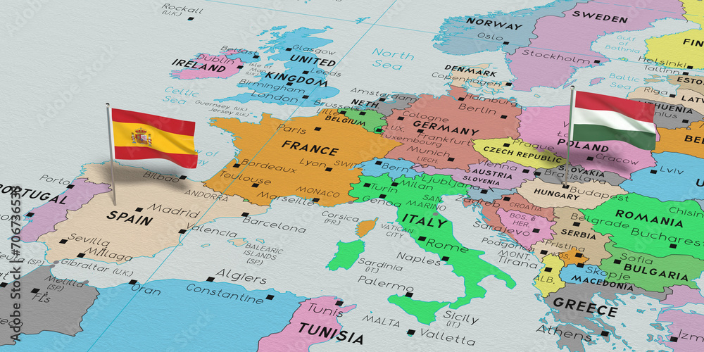 Obraz premium Spain and Hungary - pin flags on political map - 3D illustration
