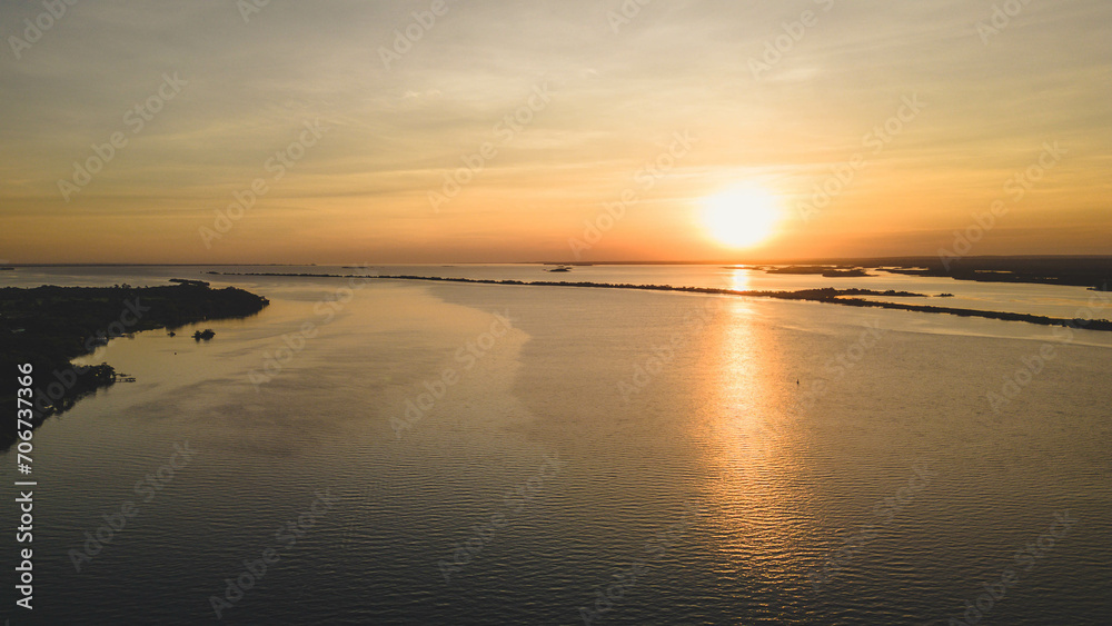 Golden sunset in Parana river or Rio Parana, one of the biggest river of South America. Panorama, SP, Brazil