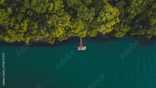 aerial view of a wooden jetty in the Parana River or Rio Parana, the second bigger river of Brazil. Panorama, SP, Brazil photo