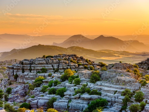 Limestone rock formations at sunset, El Torcal nature reserve, Torcal de Antequera, Malaga province, Andalusia, Spain, Europe photo