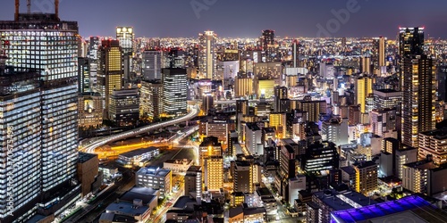 Osaka city from above with the skyline skyscrapers panorama at night in Osaka, Japan, Asia photo