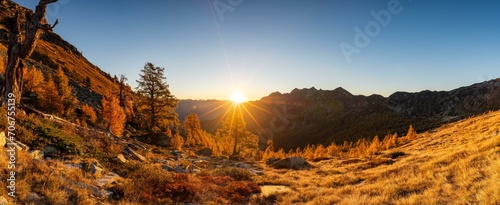 Sunrise over Alpe Alzasca in autumn, Canton Ticino, Switzerland, Europe photo