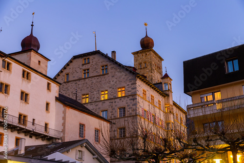 Photo of Stockalper Palace in evening. Castle in Brig, Switzerland. photo