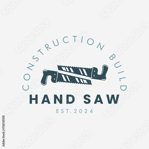 hand saw logo vintage vector illustration template design, wood work tool icon photo