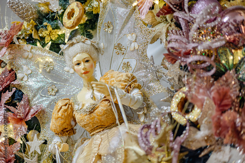 Fototapeta Naklejka Na Ścianę i Meble -  christmas golden fairy decoration with pink and gold flowers