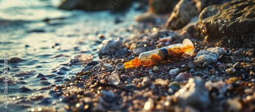The syringe is on the beach...
