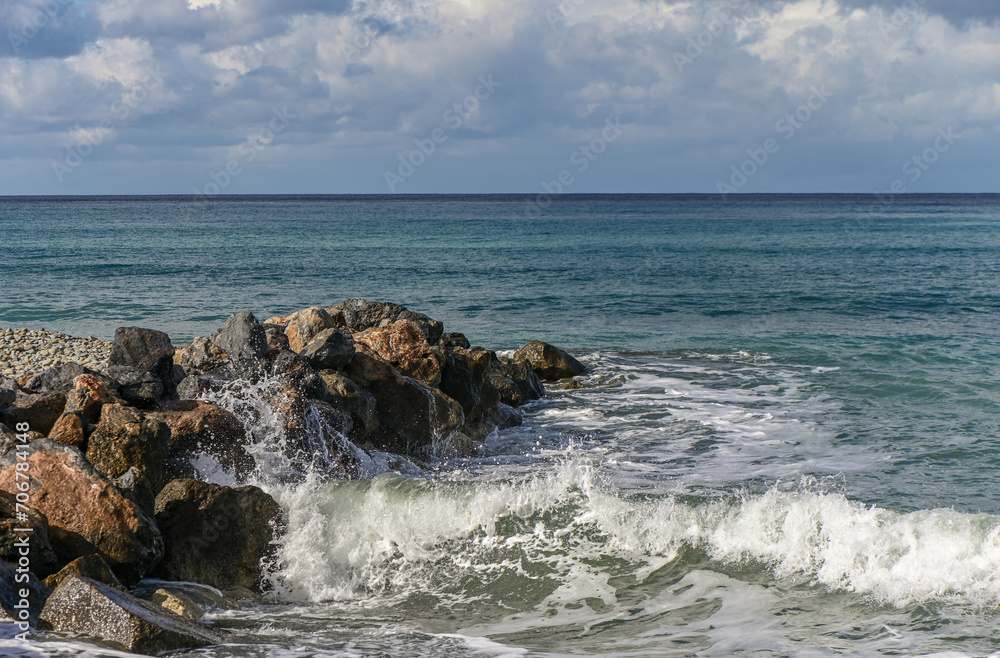 waves crashing on rocks near the shore on the Mediterranean Sea 10
