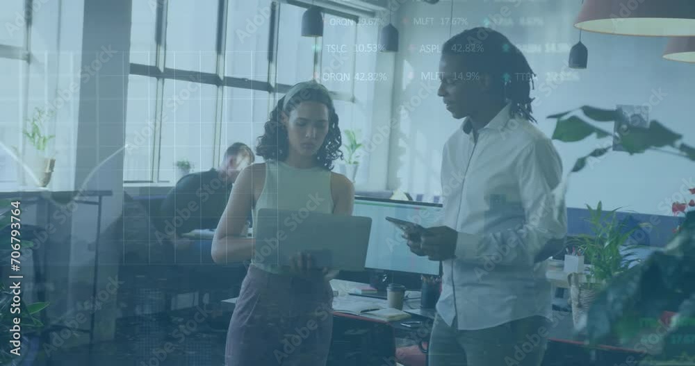 Animation of financial data processing over diverse business people in office Animation of financial data processing over diverse business people in office