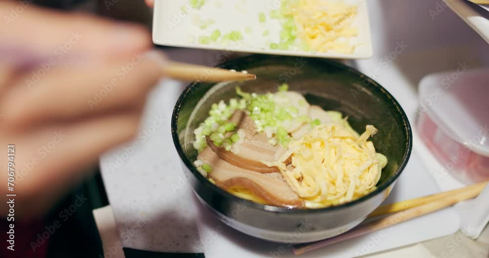 Japanese, ramen and food in restaurant with spring onion and ingredients, chopsticks and chef skill with decoration. Person cooking traditional cuisine, closeup with nutrition and garnish on noodles