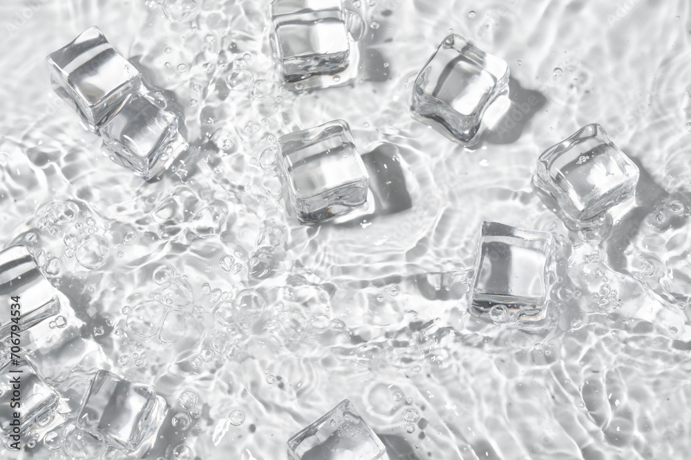 clear water wave splash and ice cubes background. clear water wave splash and ice cubes background.