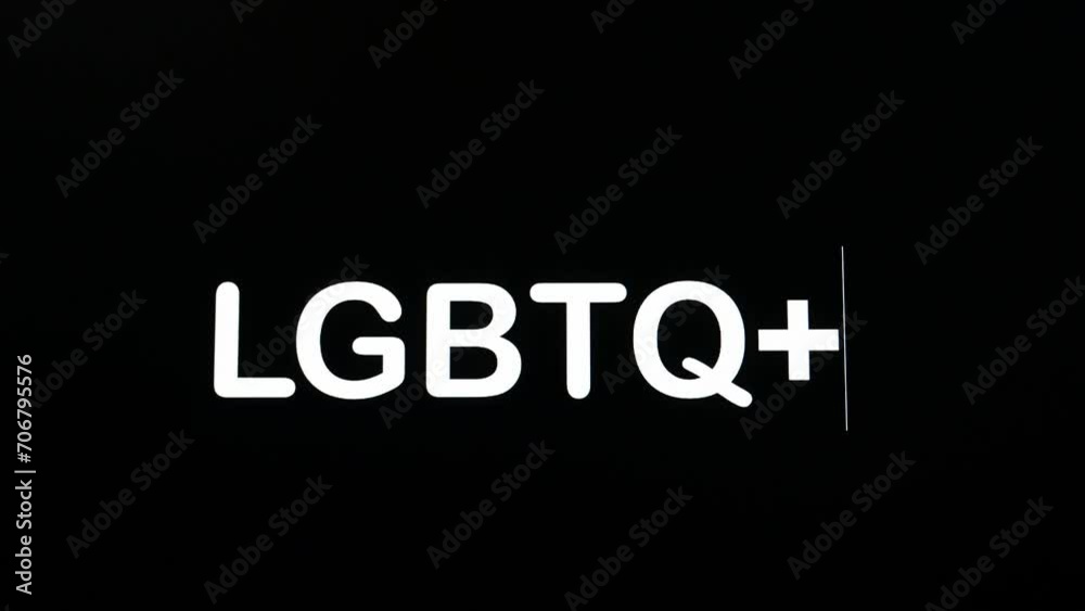 Typography appearing on the screen on a black background with the word LGBTQ+ Typography appearing on the screen on a black background with the word LGBTQ+