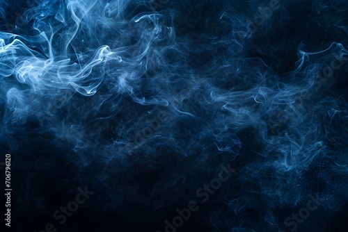 Abstract blue smoke on a dark background. Texture