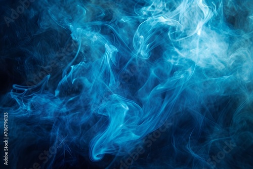 Abstract blue smoke on a dark background. Texture
