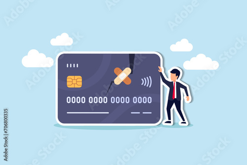 Credit repair, process to fixing poor credit standing, recover from financial mistake or negotiate with lender concept, confidence businessman stand with fixed and repaired credit card with bandage.