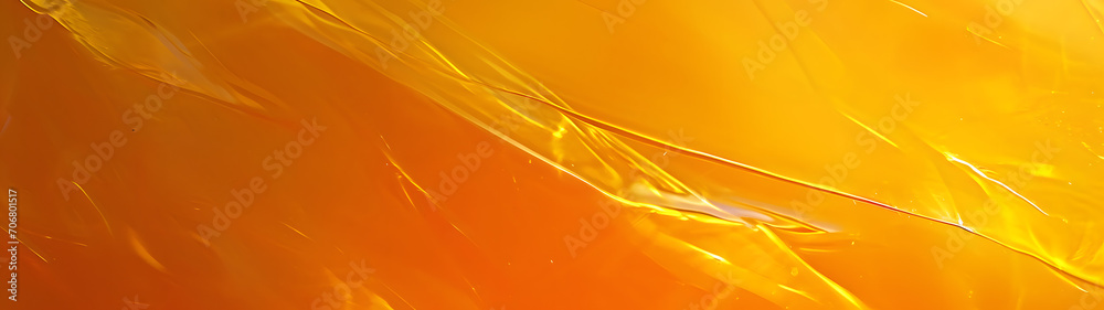 A vibrant explosion of amber and gold hues, illuminating the abstract beauty of nature's colorful artistry on a close-up of a yellow surface A vibrant explosion of amber and gold hues, illuminating the abstract beauty of nature's colorful artistry on a close-up of a yellow surface