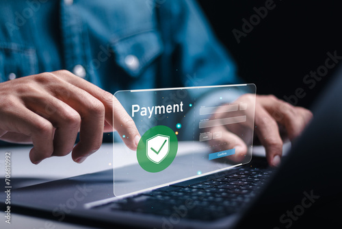 Businessman using laptop to online payment, banking and online shopping. financial transaction. Digital online payment concept. photo