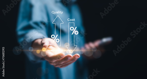 Cost and quality control concept, Businessman holding with virtual quality control growth graph and cost reduction. cost optimization for products or services to improve customer satisfaction.