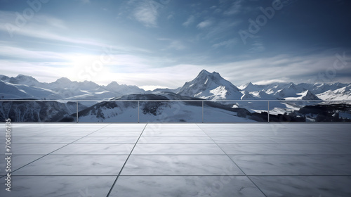 Square concrete floor with amazing winter snow mountain landscape © Elaine