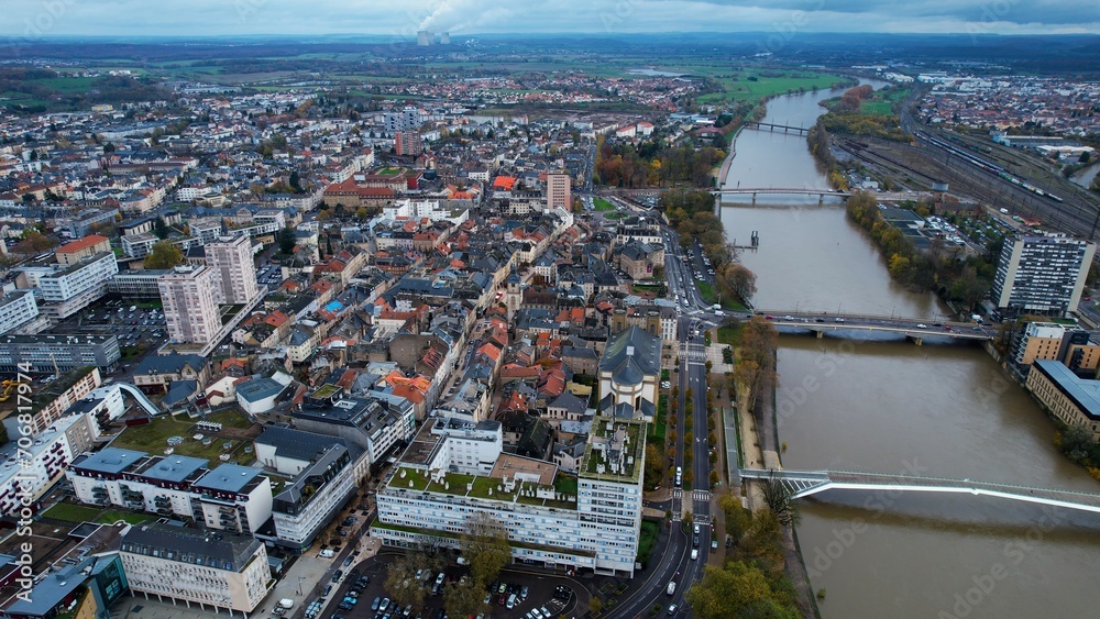 Aerial around the old town of Thionville in France on a cloudy morning in autumn
