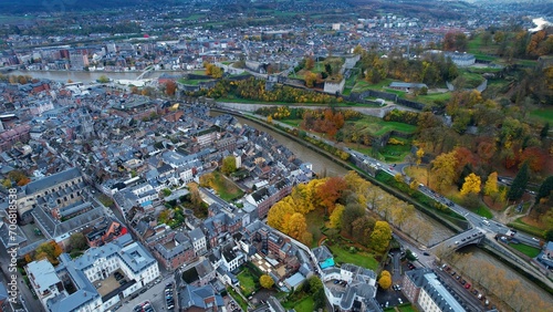 Aerial around the old town of Namur in Belgium on a cloudy afternoon in autumn	 #706818538