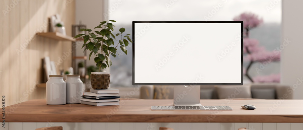A beautiful, modern home workspace with a PC computer mockup and accessories on a hardwood desk. A beautiful, modern home workspace with a PC computer mockup and accessories on a hardwood desk.