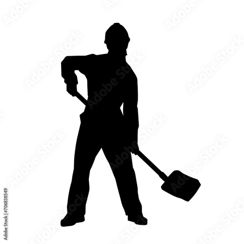 Silhouette of a worker carrying shovel tool. Silhouette of a worker in action pose using shovel tool.