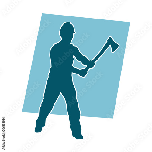 Silhouette of a worker in action pose using his axe tool.