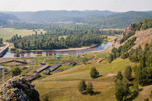 the beautiful village of Kutanovo Burzyansky district in the Republic of Bashkortostan on the banks of the Belaya River surrounded by the Ural Mountains on a summer day photo