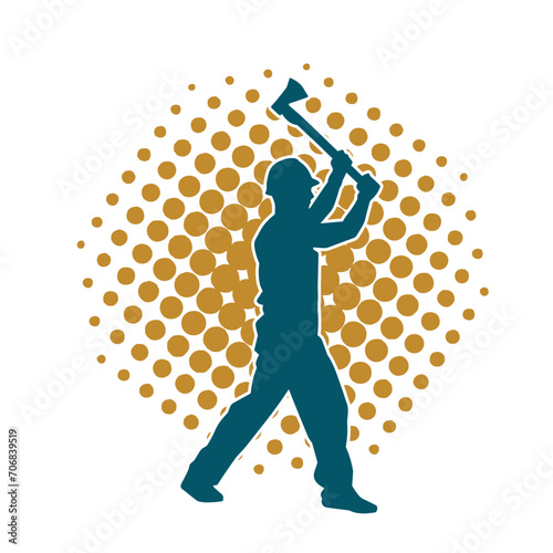 Silhouette of a worker in action pose using his axe tool.