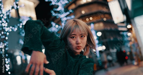 Photography Japanese woman, dancer and night in street, moving body and freedom for performance in city