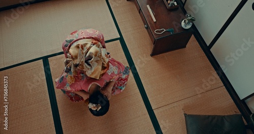 Photography Japanese woman, praying and bow in shinto religion with meditation, faith and traditional clothes on floor
