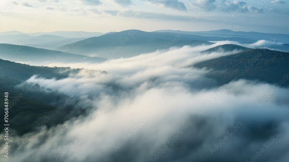 Foggy morning in the mountains. Panoramic view.