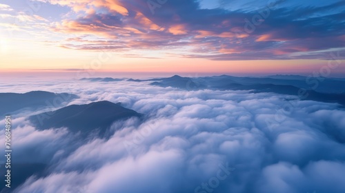 Aerial view of the clouds in the sky at sunrise. Nature background