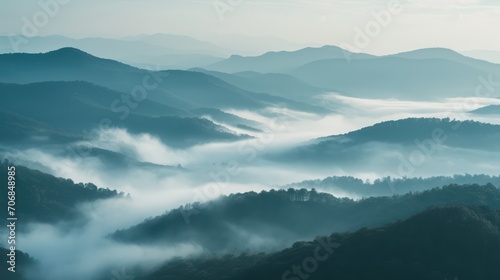 Foggy morning in the mountains. Panoramic view.