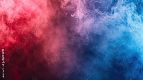 Dense multicolored smoke of red and blue colors on a black isolated background. 